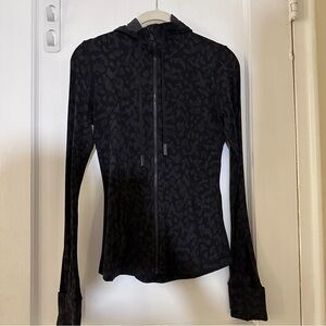 Lululemon Hooded Define Jacket in Leopard Camo Deep Coal Multi Size